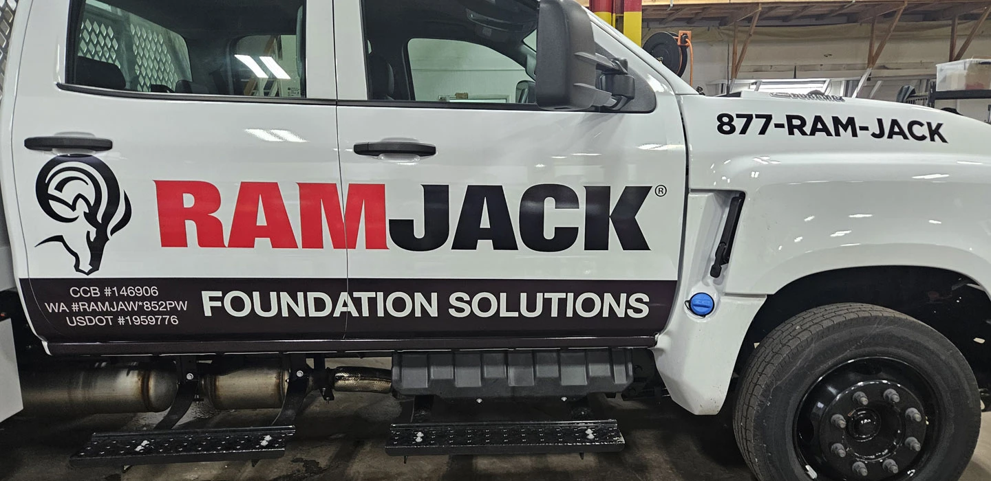 Ram Jack Foundation Solutions truck with commercial wrap and USDOT lettering applied