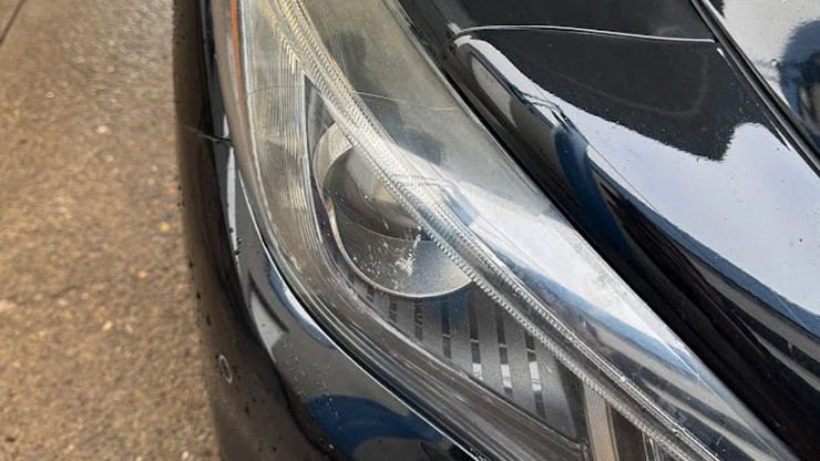Foggy, oxidized headlight lens on a dark sedan, photographed by Blue Rose Auto in Springfield, OR