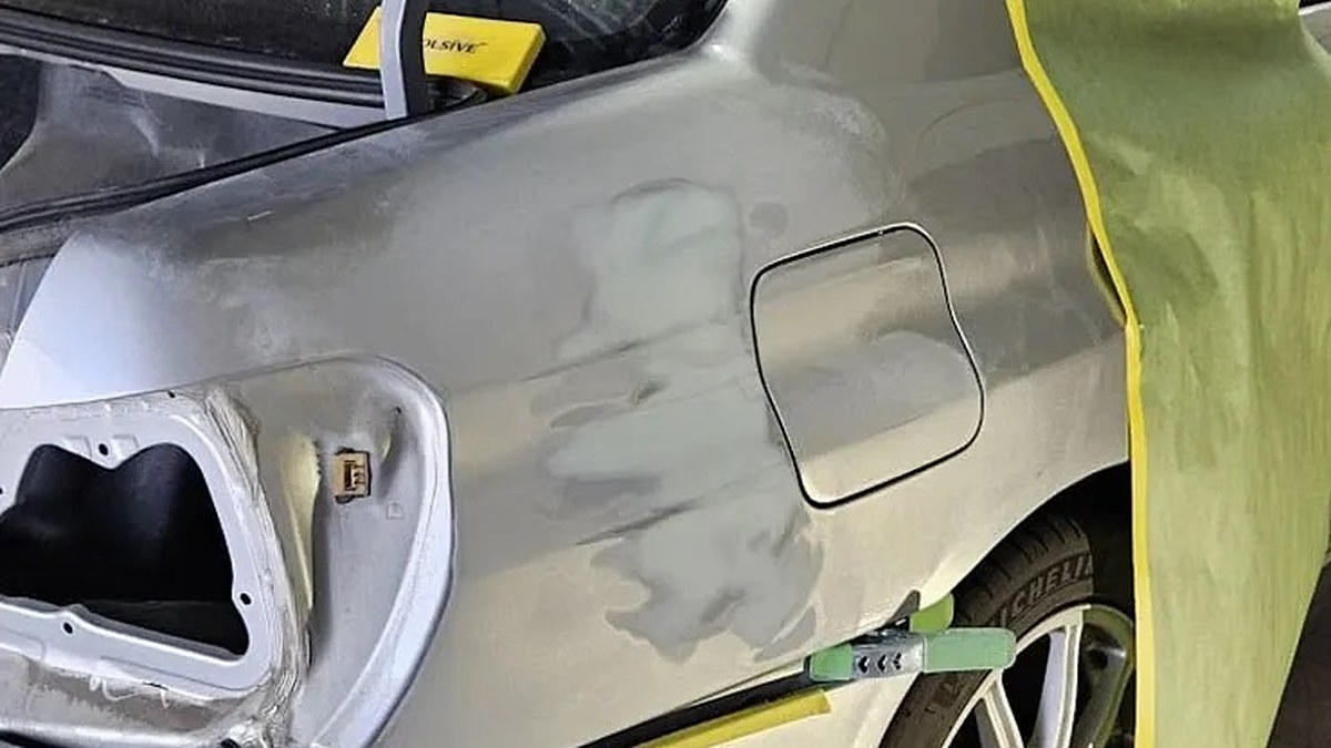 Quarter panel in primer during collision repair in Springfield, OR