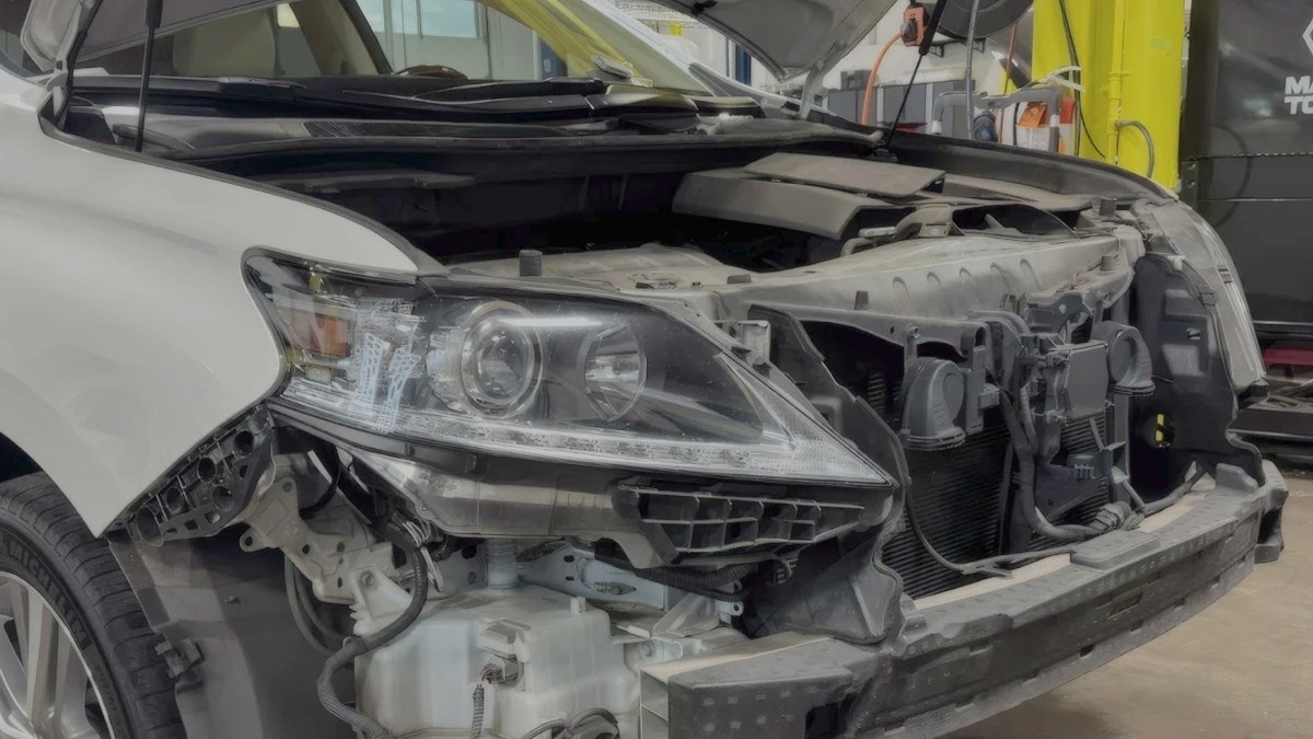 Front end opened up for an insurance collision estimate at Blue Rose Auto in Springfield, OR