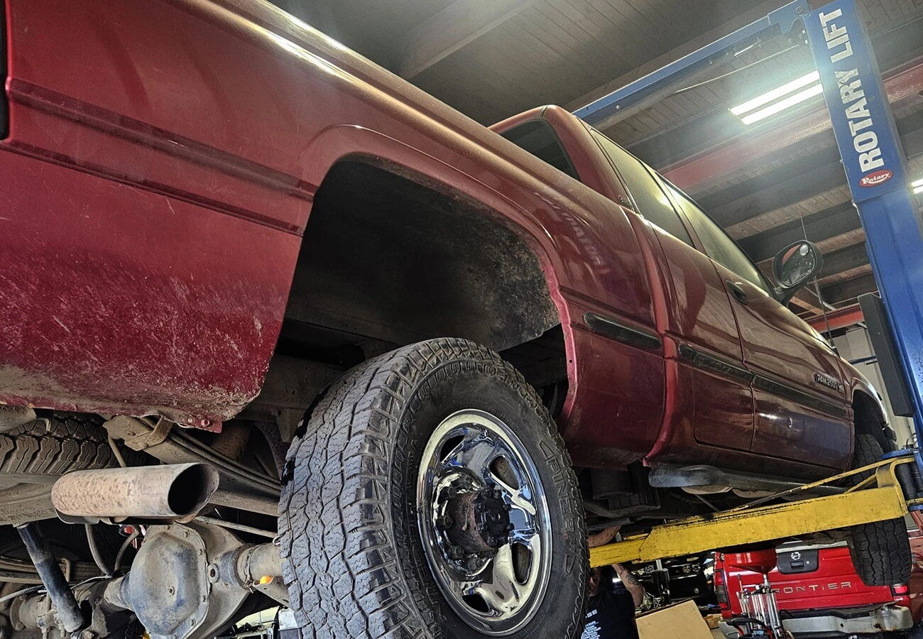 Pickup on the lift for a brake check before Willamette Pass winter driving at our Springfield OR shop