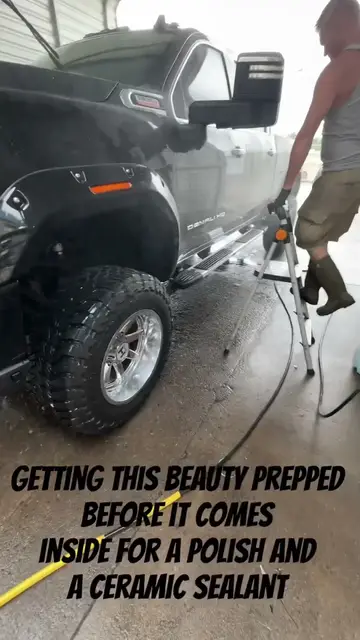A lifted Denali in the shop