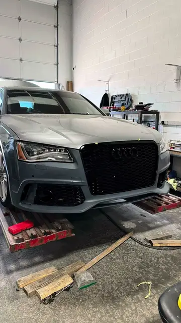 New front bumper and headlights on an Audi